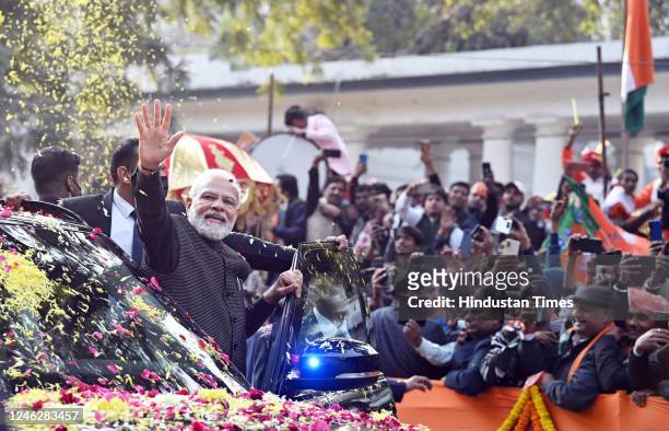 Prime Minister Narendra Modi during a roadshow ahead of the BJP national executive meet on January 16, 2023 in New Delhi, India.
