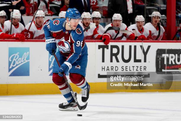 Mikko Rantanen of the Colorado Avalanche skates in front of the Detroit Red Wings' bench at Ball Arena on January 16, 2023 in Denver, Colorado.