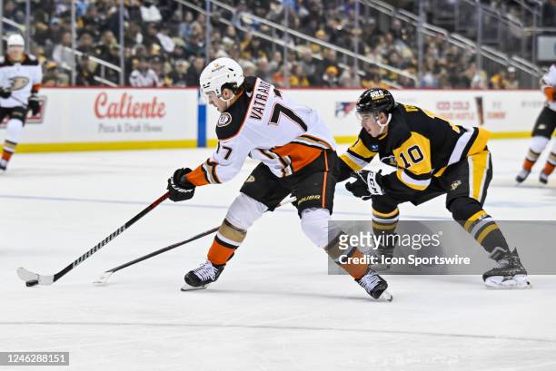 Anaheim Ducks Right Wing Frank Vatrano skates with the puck as Pittsburgh Penguins Winger Drew O'Connor defends during the second period in the NHL...