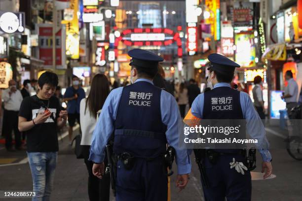 Police officers patrol the Kabukicho entertainment area on June 05, 2020 in Tokyo, Japan. On May 25, the Japanese government lifted a nation wide...