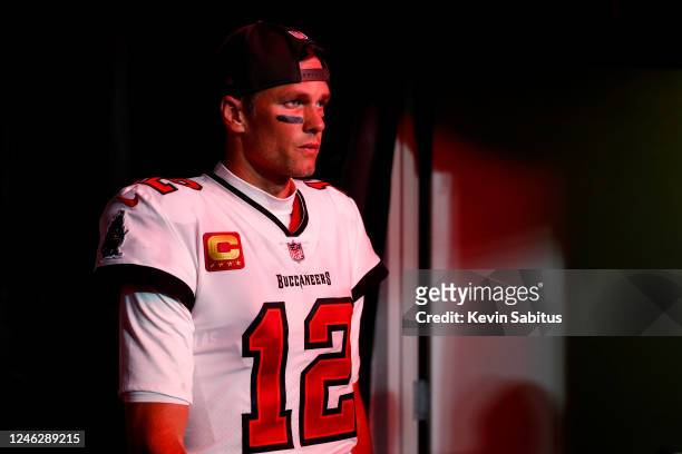 Tom Brady of the Tampa Bay Buccaneers walks through the tunnel prior to an NFL wild card playoff football game against the Dallas Cowboys at Raymond...