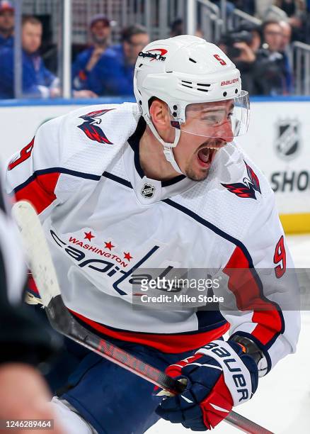 Dmitry Orlov of the Washington Capitals celebrates after scoring the game-winning goal against the New York Islanders during overtime at UBS Arena on...