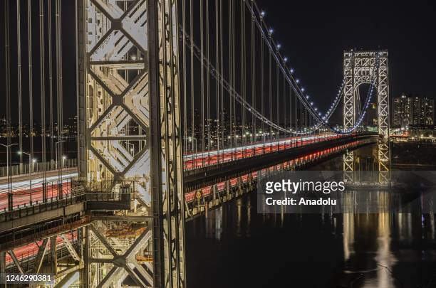 George Washington Bridge is illuminated on Martin Luther King Jr. Day as seen from the Fort Lee Historic Park in Fort Lee of New Jersey, United...