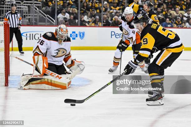 Pittsburgh Penguins Left Wing Jake Guentzel puts a shot on Anaheim Ducks Goalie John Gibson during the third period in the NHL game between the...