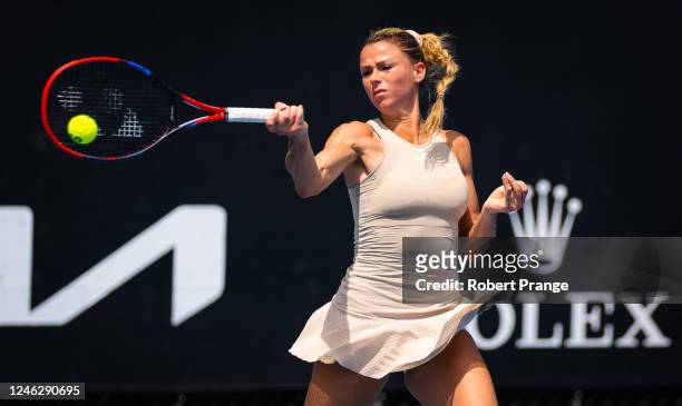 Camila Giorgi of Italy in action against Anastasia Pavlyuchenkova of Russia during her first round match on Day 2 of the 2023 Australian Open at...