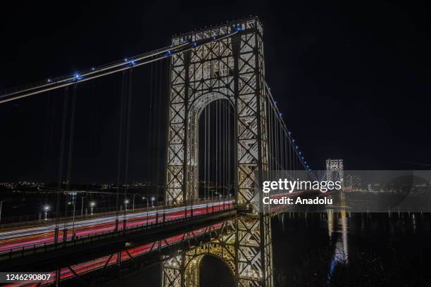 George Washington Bridge is illuminated on Martin Luther King Jr. Day as seen from the Fort Lee Historic Park in Fort Lee of New Jersey, United...