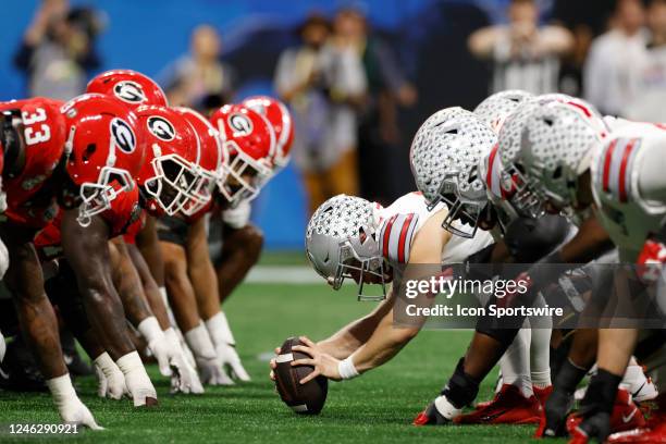 Ohio State Buckeyes line up at the line of scrimmage against the Georgia Bulldogs during the Chick-fil-A Peach Bowl semifinal game on December 31,...