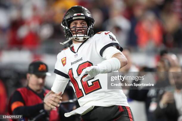 Tampa Bay Buccaneers quarterback Tom Brady yells to the crowd before the NFC Wild Card Playoff game between the Dallas Cowboys and the Tampa Bay...