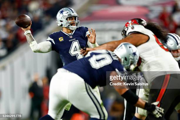 Dak Prescott of the Dallas Cowboys throws a pass during the fourth quarter of an NFL wild card playoff football game against the Tampa Bay Buccaneers...