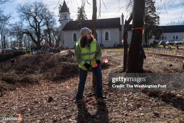 Descendants and student volunteers, including Dr. Laura Masur, an Assistant Professor of Anthropology at Catholic University, gathered at the...