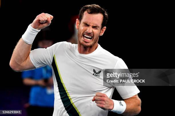 Britain's Andy Murray celebrates victory against Italy's Matteo Berrettini during their men's singles match on day two of the Australian Open tennis...