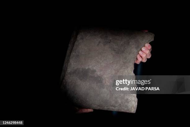 Kristel Zilmer, professor of written culture and iconography at the Museum of Cultural History, displays on January 17, 2032 in Oslo a sandstone...