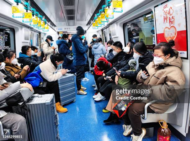 Passengers travel on subway Line 1 in Beijing, capital of China, Jan 17, 2023.
