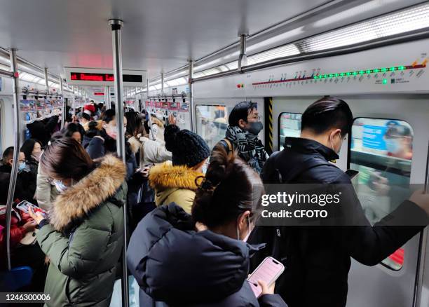 Passengers travel on subway Line 1 in Beijing, capital of China, Jan 17, 2023.