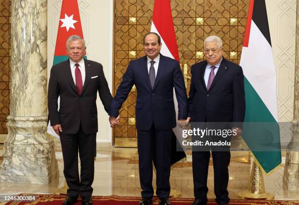 Egyptian President Abdel Fattah El-Sisi , Palestinian President Mahmud Abbas and the King of Jordan Abdullah II pose for a photo ahead of tripartite...