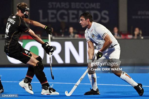 German Moritz Ludwig and Belgium's Alexander Hendrickx pictured during a game between Belgium's Red Lions and Germany, in the first round of the 2023...