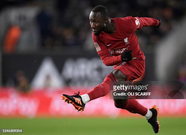 Liverpool's Guinean midfielder Naby Keita kicks the ball during the FA Cup third round football match between Wolverhampton Wanderers and Liverpool...
