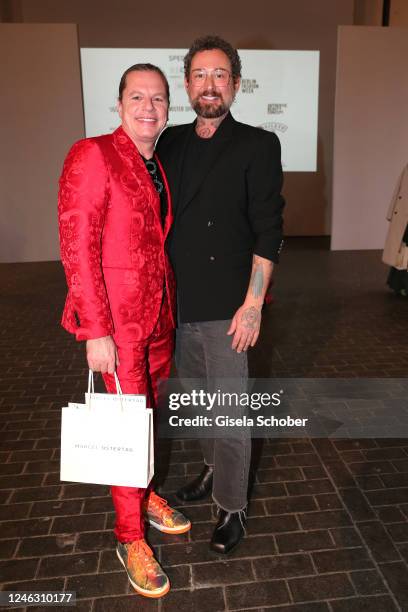 Stefan Krober and fashion designer Marcel Ostertag attend the Marcel Ostertag fashion show DISCOTECA during the W.E4. Fashion Day as part of Berlin...