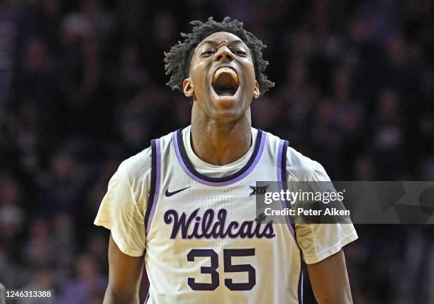 Nae'Qwan Tomlin of the Kansas State Wildcats reacts after a Wildcats basket against the Kansas Jayhawks in the first half at Bramlage Coliseum on...