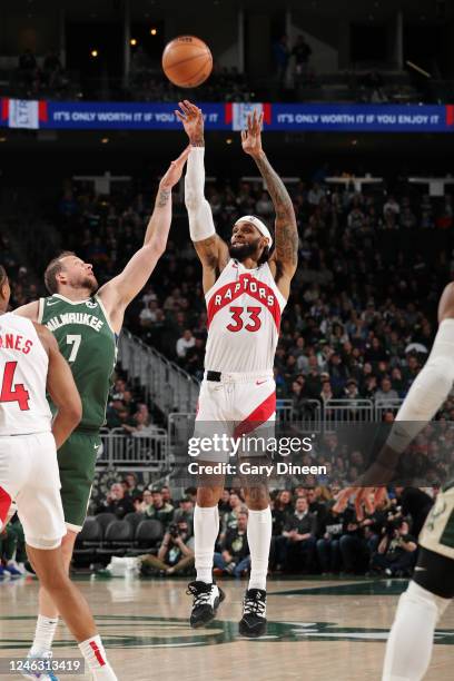 Gary Trent Jr. #33 of the Toronto Raptors shoots the ball during the game against the Milwaukee Bucks on January 17, 2023 at the Fiserv Forum Center...