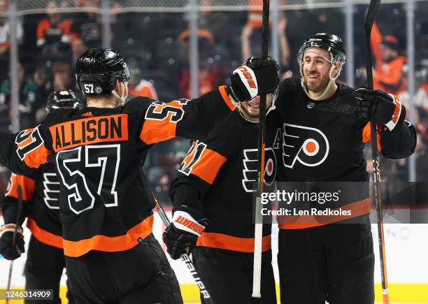 Kevin Hayes of the Philadelphia Flyers celebrates his second of two third-period goals against the Anaheim Ducks with Wade Allison and Scott Laughton...