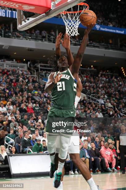 Jrue Holiday of the Milwaukee Bucks drives to the basket during the game against the Toronto Raptors on January 17, 2023 at the Fiserv Forum Center...