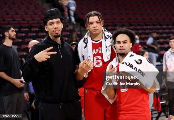 Danny Green of the Memphis Grizzlies, Kenneth Lofton Jr. #6 and Jacob Gilyard of the Memphis Hustle pose for a photograph after a win against the...