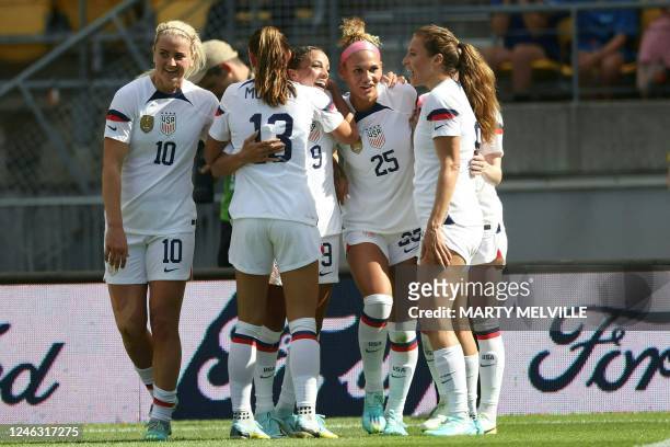 Players celebrate scoring a goal during the women's friendly football match between New Zealand and the US at Sky Stadium in Wellington on January...