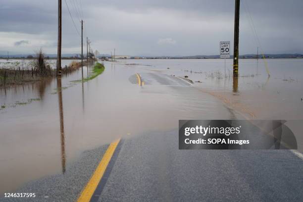 The road in Gilroy was closed due to flooding. Powerful storm systems have slammed California since December 2022, with thousands of people impacted...