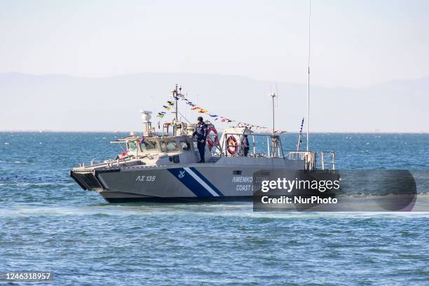 Hellenic Coast Guard vessel LS 135 / ?? 135 as seen patrolling in the waters of The Thermaic Gulf or Gulf of Salonika with the celebration flags and...