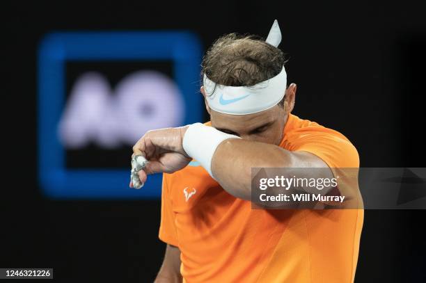 Rafael Nadal of Spain reacts in their round two singles match against Mackenzie McDonald of the United States during day three of the 2023 Australian...