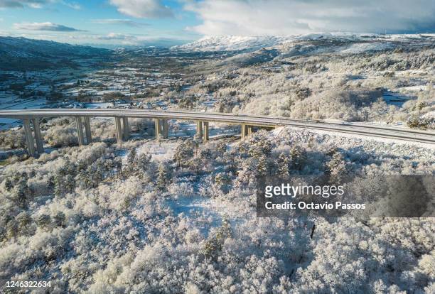 General view of snow lying on the A24 motorway in Vila Pouca de Aguiar on January 18, 2023 in Vila Real, Portugal. The storms 'Gerard' and 'Fien' are...