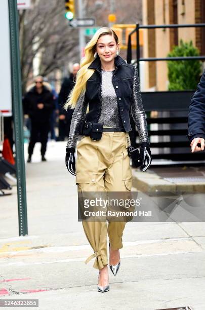 Gigi Hadid seen walking to "Maybelline" commercial in midtown on January 17, 2023 in New York City.