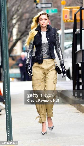 Gigi Hadid seen walking to "Maybelline" commercial in midtown on January 17, 2023 in New York City.