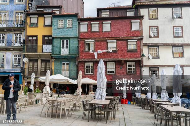 View of La Ribeira Square located on the banks of the Douro River, it is one of the oldest in Porto in which its colorful houses with colored tiles...