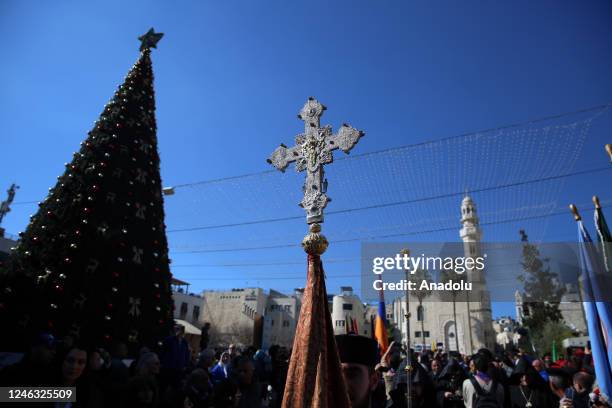 Armenian Orthodox arrive to the Church of Nativity, where it is believed that Jesus was born, in the West Bank city of Bethlehem to celebrate...