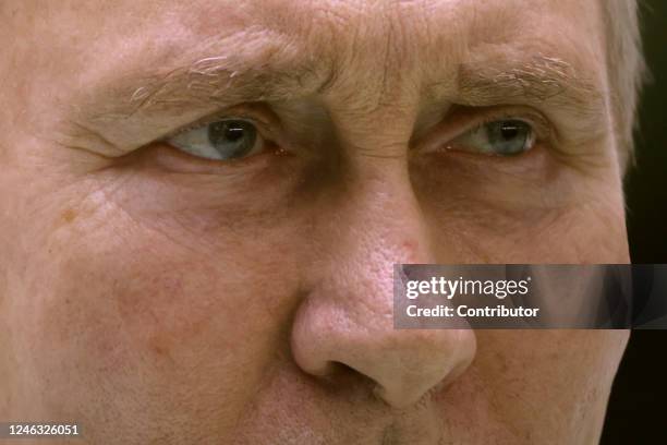 Russian President Vladimir Putin speaks as he meets with workers at the Obukhov State Plant, January 18, 2023 in Saint Petersburg, Russia.