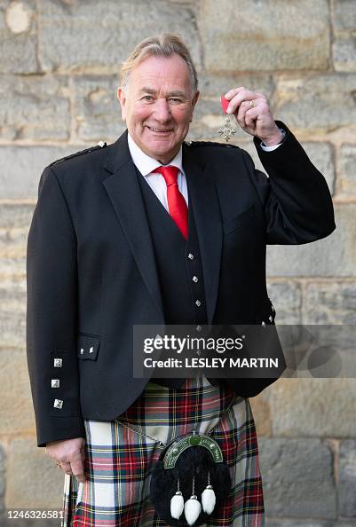 Alan Rough Scottish former goalkeeper, Alan Rough poses with his medal after ...