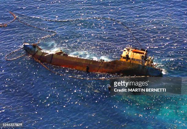 Aerial view of the tanker Jessica leaning on its right side by 69 degrees, 800 meters from San Cristobal island, Galapagos Archipelago, 27 Januay...