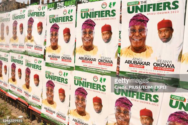 Electoral posters for the candidate of the opposition Peoples Democratic Party Atiku Abubakar are seen near the venue of a party campiagn rally in...