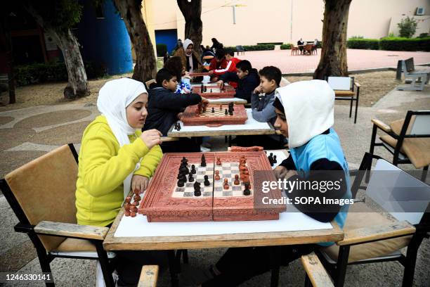 Palestinian children participate in a fun day as part of community mental health programs, to relieve the psychological and living stress that...