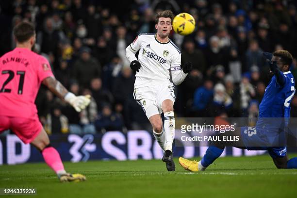 Leeds United's English striker Patrick Bamford scores his team fourth goal past Cardiff City's English goalkeeper Jak Alnwick during the English FA...