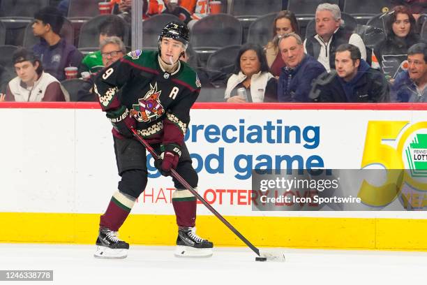 Arizona Coyotes Left Wing Clayton Keller controls the puck during the first period of the National Hockey League game between the Arizona Coyotes and...