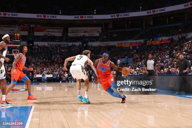 Luguentz Dort of the Oklahoma City Thunder moves the ball during the game against the Indiana Pacers on January 18, 2023 at Paycom Arena in Oklahoma...
