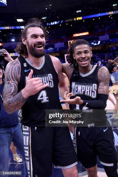 Steven Adams and Ja Morant of the Memphis Grizzlies celebrate after the game against the Cleveland Cavaliers on January 18, 2023 at FedExForum in...