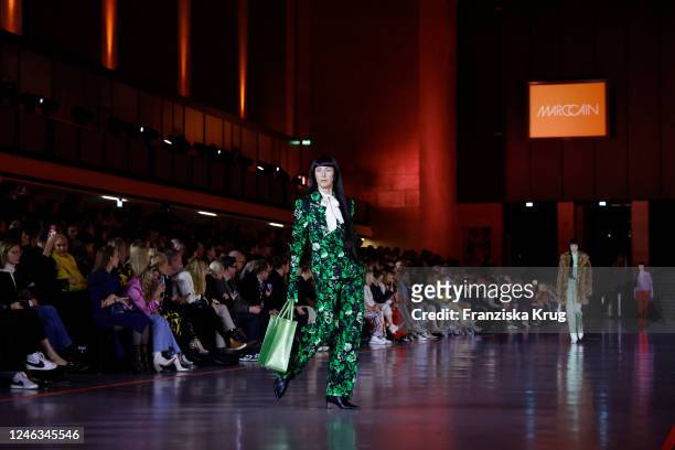 Model walks the runway at the Marc Cain Fashion Show Fall/Winter 2023 at Tempelhof Airport on January 18, 2023 in Berlin, Germany.