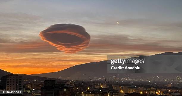 Lenticular clouds appear over Turkiye's Bursa province at early times of the morning on January 19, 2023.