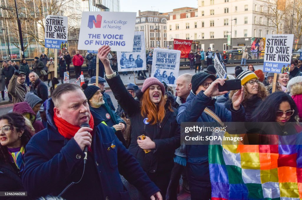 A protester holds up a Royal College Of Nursing placard as Alex News  Photo - Getty Images