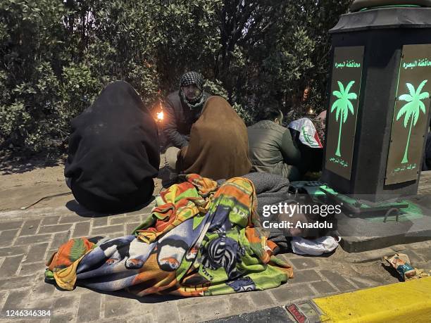 Fans sleep outside the Basra Stadium ahead of Arabian Gulf Cup final match between Iraq and Oman in Basra, Iraq on January 19, 2023.