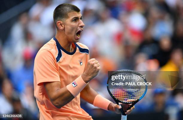 Australia's Alexei Popyrin reacts after a point against Taylor Fritz of the US during their men's singles match on day four of the Australian Open...